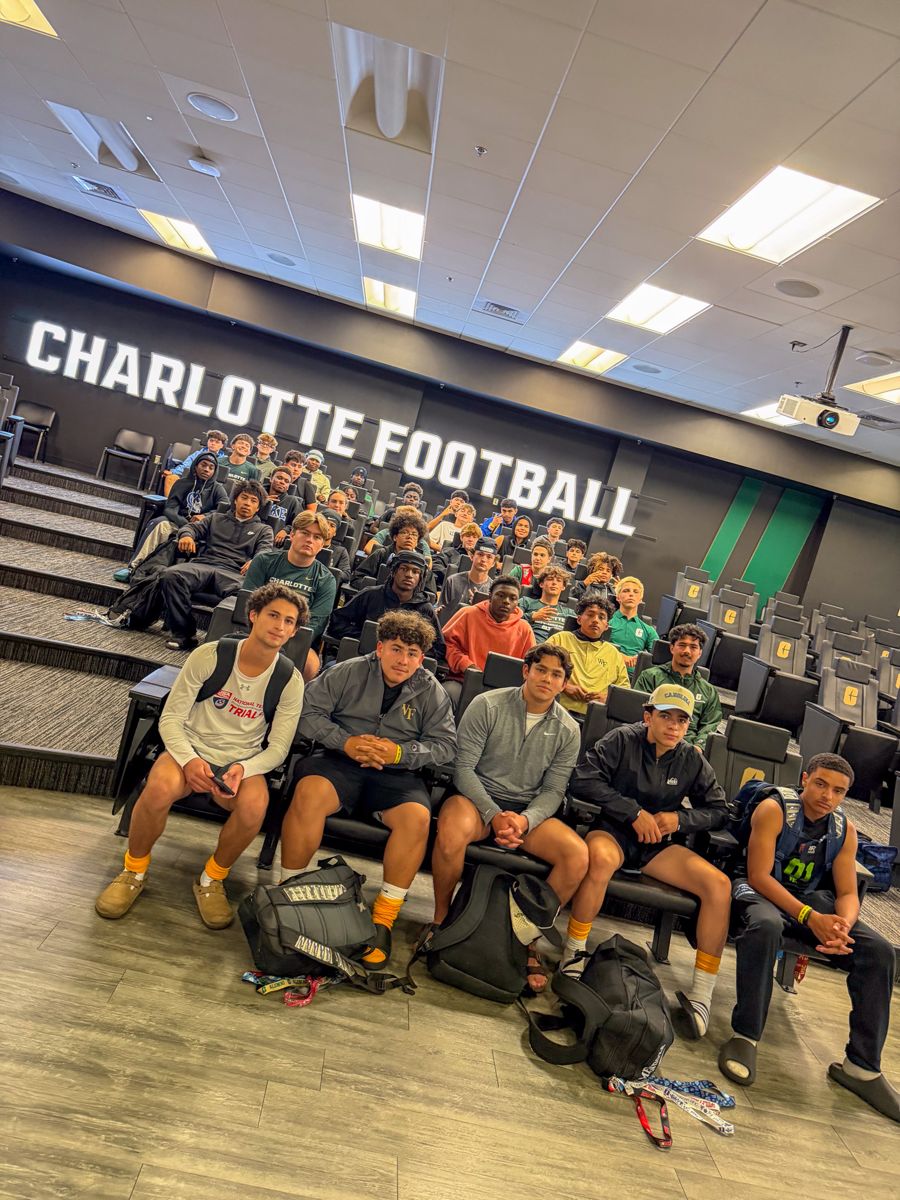 TOUR athletes in the Charlotte Football team theater