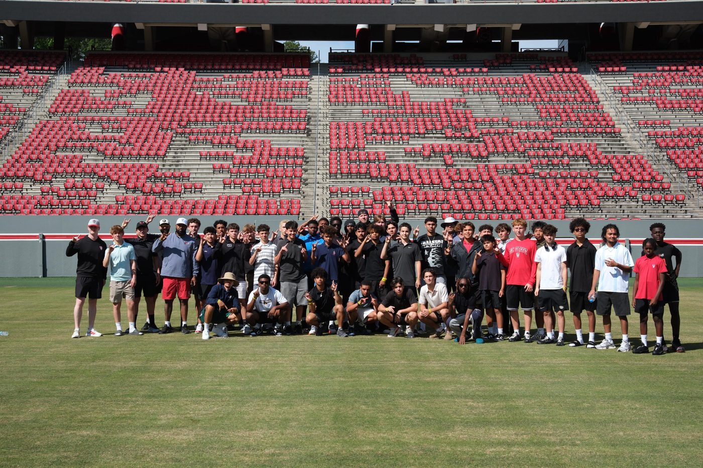 TOUR group on the field at NC State's stadium