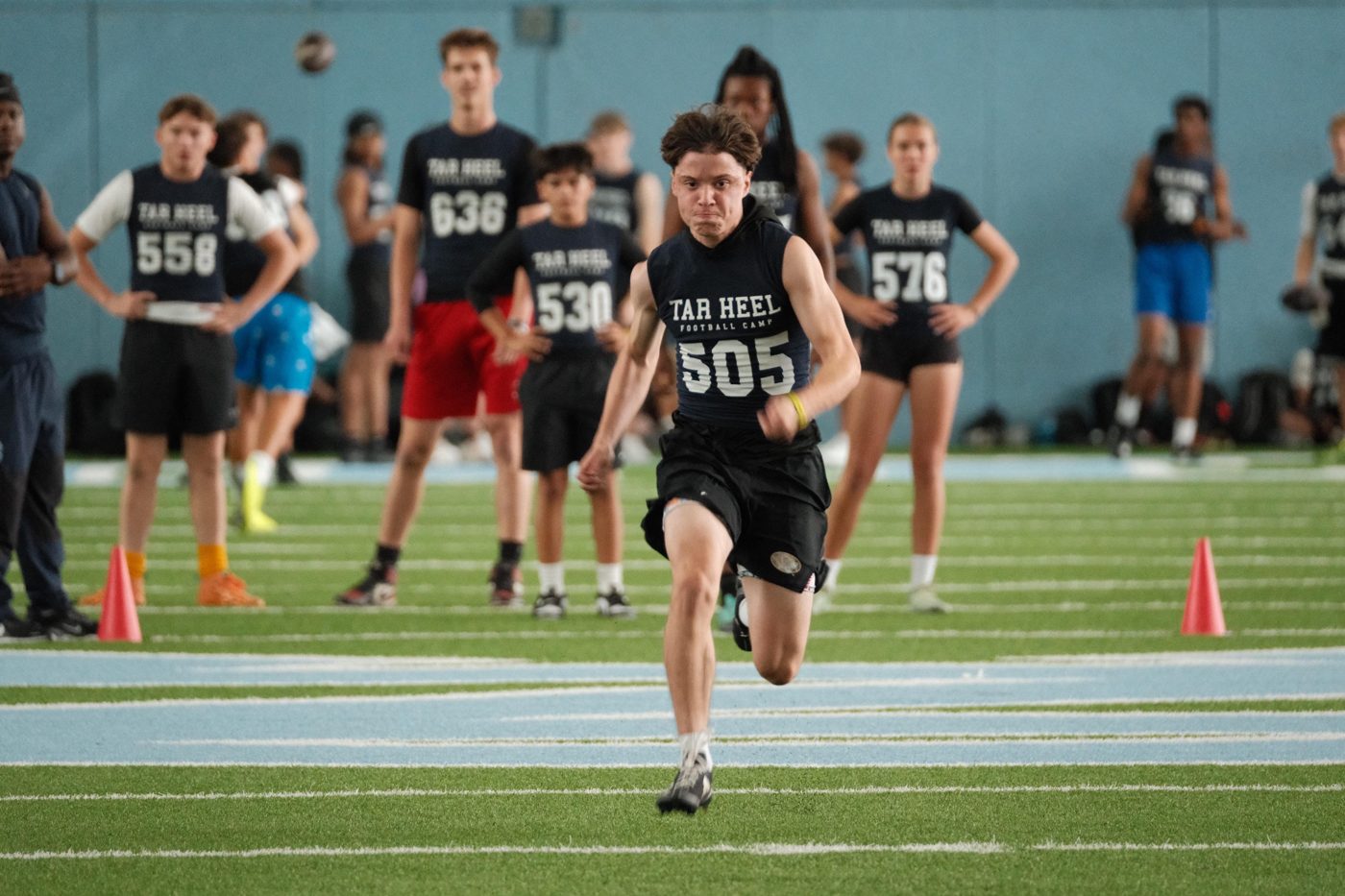 TOUR athlete sprinting at the UNC Tar Heel camp